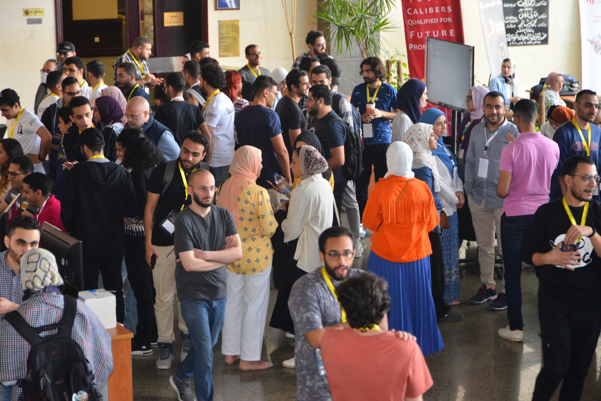 Packed crowd at an Egyptian game and technology event